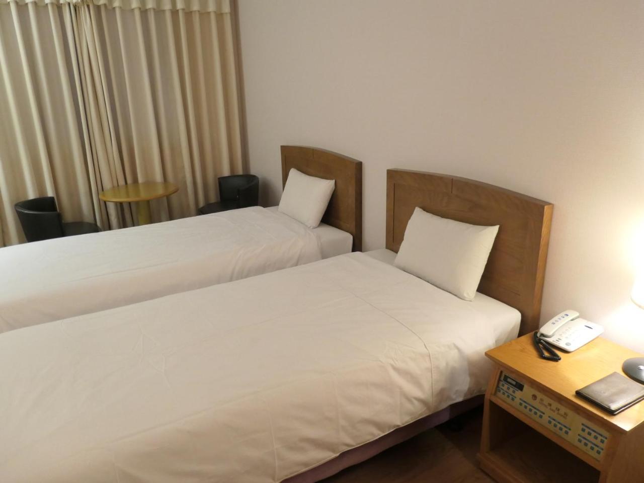 Daedong Hotel Jeju Quarto foto
